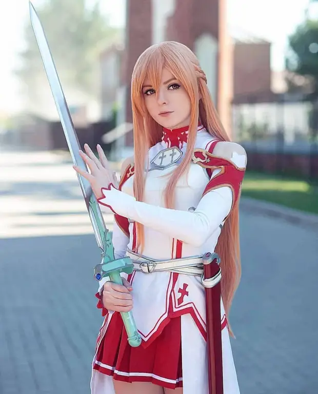 Menikmati Anime Terbaru Gambar seseorang menonton anime di laptop